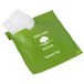 A green plastic bag with white text that reads "Basic Earth Botanicals" containing a white plastic shower cap with white text.