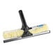 An Ettore squeegee with a white and yellow sponge on it.