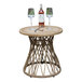 An Outdoor Interiors round teak and wicker table with wine bottles and glasses on it.