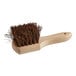 A Lavex wok brush with a wood handle and brown bristles.