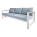 An Outdoor Interiors white aluminum sofa with blue cushions.