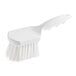 A close-up of a white Lavex pot scrub brush with a white handle.