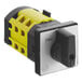 A close-up of a black and yellow Estella rotary cam switch with white accents.