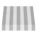 A close-up of a gray and white striped fixed fabric awning with a rigid valance.