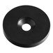 A black rubber disc with a white circle in the middle.