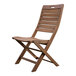 An Outdoor Interiors Eucalyptus wood folding chair with a white background.
