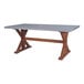 An Outdoor Interiors grey rectangular composite and eucalyptus dining table with wooden legs.