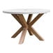 An Outdoor Interiors ivory round table with wooden legs.