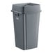 A Lavex gray plastic trash can with a lid.