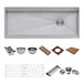 A Ruvati stainless steel workstation sink with various accessories inside.