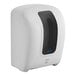 A white Lavex automatic paper towel dispenser.