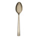 A Reserve by Libbey Santorini Gold stainless steel serving spoon with a metal handle.