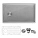 A white background with a Ruvati stainless steel sink with a drain and faucet parts.