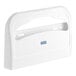 A white plastic Lavex toilet seat cover dispenser.