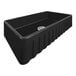A rectangular black Ruvati farmhouse sink with a drain.