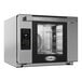 A black and silver Cadco Bakerlux countertop convection oven with a glass door.