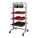 A white Udizine mobile retail clothing display stand with 3 shelves.