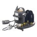 A black Bar Maid Submersible Electric Glass Washer with round brushes on a counter.