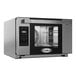 A stainless steel Cadco Bakerlux countertop convection oven with a glass door.