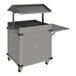 A grey Cadco MobileServ grab and go food cart with an open top.