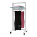 A white Udizine mobile clothing display rack with two dresses on it.