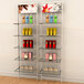 A white Udizine Vertik wall-mount clothing display with shelves holding various products.