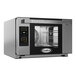 A Cadco Bakerlux countertop convection oven with a touch control panel.