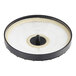 A black and white circular air filter with white paper inside.