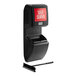 A black wall-mounted Lavex windshield wash station with a red self service sign.