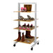 A white Udizine retail clothing display stand with shoes on a shelf.