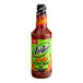 A bottle of Zing Zang Blazing Bloody Mary Mix on a table with other hot sauces.