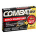 A box of Combat Max roach bait with 12 small roach baits inside.
