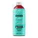 A blue plastic bottle of Smartfruit Renew Strawberry Acai Refresher concentrate with a red label and red liquid inside.