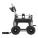 A black and silver Gorilla hose reel cart with black wheels.