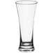 An Acopa flared Pilsner glass with a clear bottom and rim.