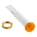 A white indicator light with a yellow light and a gold nut.
