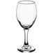 An Acopa wine glass with a short stem and clear glass.