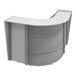 A white laminate curved reception desk.