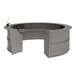 A Correll curved reception desk with a laptop on it.