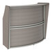 A Correll reception desk with a curved top.