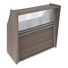 A Correll walnut laminate reception desk with a see-through counter panel.