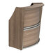 A Correll walnut laminate reception counter with a curved wooden top.