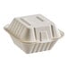 A Dart ProPlanet white molded fiber bagasse hinged takeout container with a lid.