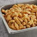 A metal container filled with September Farms Breaded Pizza Cheese Curds.