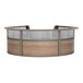 A walnut laminate Correll reception desk with a wooden curved counter and a glass panel.