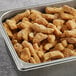 A metal pan filled with September Farms Breaded Cheese Curds.