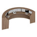 A Correll walnut laminate curved U-shaped reception desk with a computer and telephone on it.