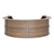 A wooden Correll curved reception counter with a metal frame.