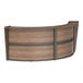 A walnut laminate Correll reception counter with a curved top and curved sides.