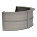 A grey Ash laminate curved reception desk with a curved top.